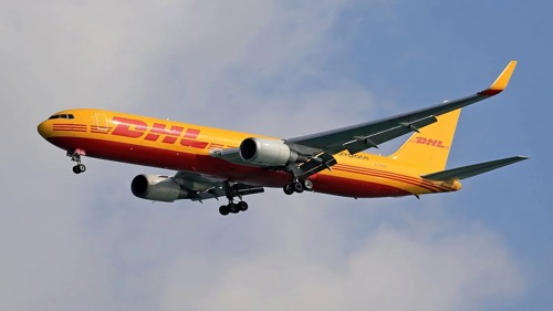 Yellow Airplane in Sky